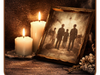 נרות זיכרון, תמונה ופרח מוחשכים לציון יום הזיכרון לשואה